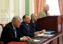 Тем временем